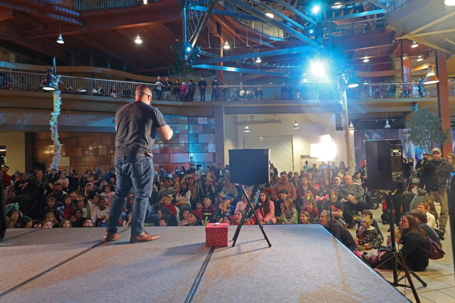 Chris Wheel entertaining a large audience at Destiny USA